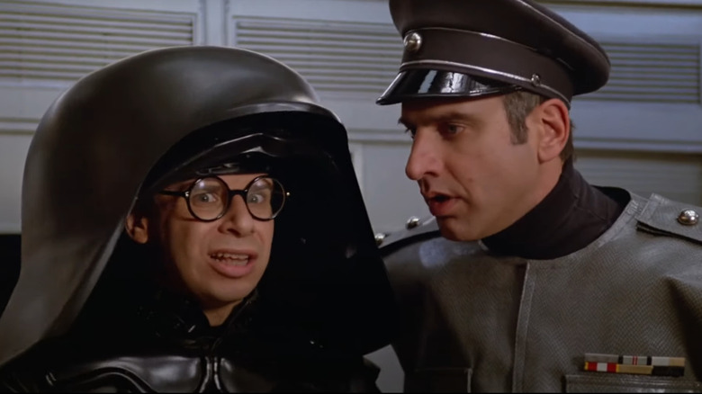 Colonel Sandurz talks to a worried Dark Helmet in "Spaceballs" (1987)