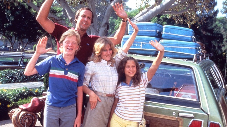 The Griswold family waving before leaving for Wallyworld in "National Lampoon's Vacation"