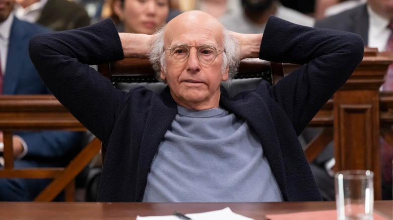 Larry David sits in a courtroom in "No Lessons Learned"
