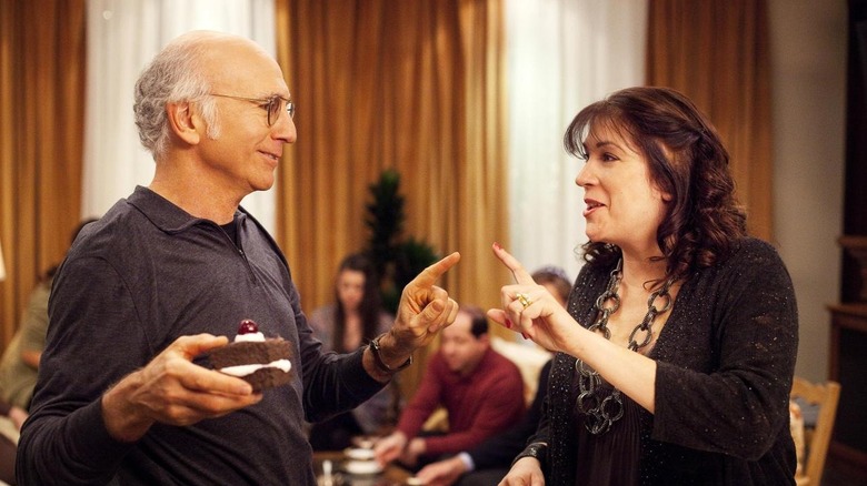 Larry argues with a woman in "Palestinian Chicken"