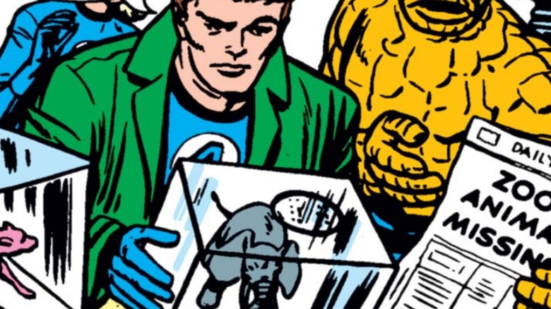 Reed Richards holding stolen, shrunken zoo animals