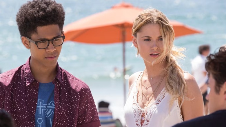 Alex Wilder and Karolina on the beach in "Runaways."