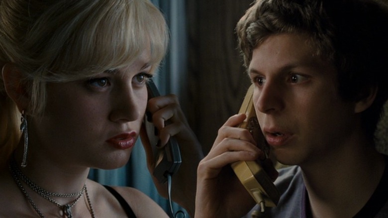 Scott Pilgrim (Michael Cera) talking on the phone to his ex-girlfriend, Natalie (Brie Larson)