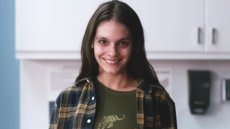 Laura Weaver smiles broadly in "Smile" (2022)