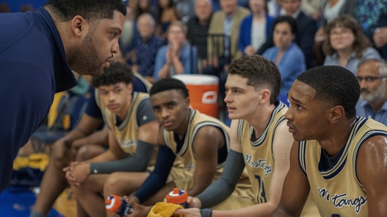 The Mustangs basketball team getting a talk from their coach