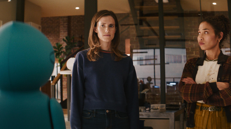 Gemma and Tess facing a round blue robot in "M3GAN 2.0" (2025)