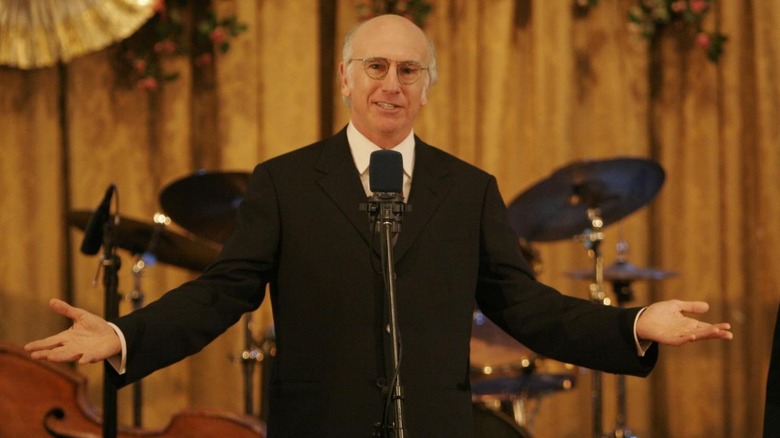 Larry speaks at a bat mitzvah in "The Bat Mitzvah"