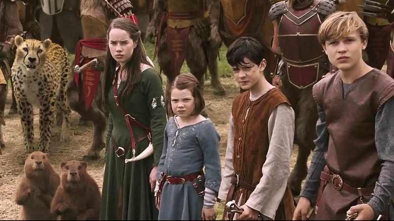 The Pevensie children and various animals in Chronicles of Narnia (2005)