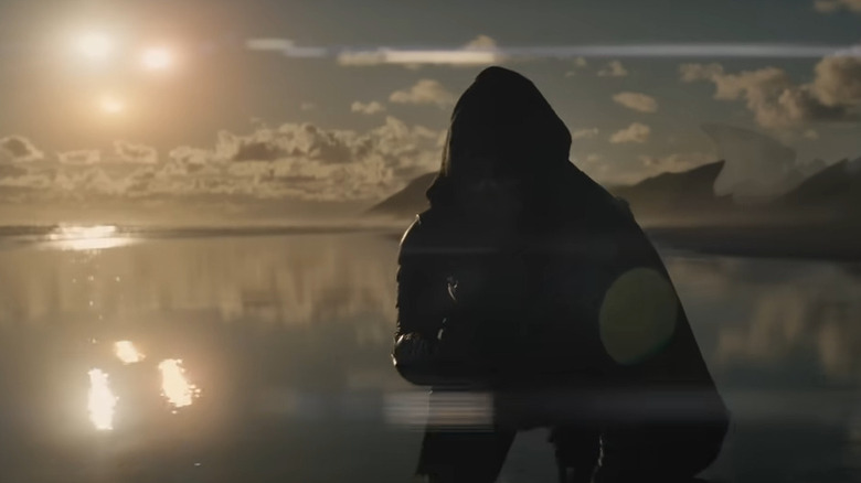 Yautja looking at three suns in Predator: Badlands