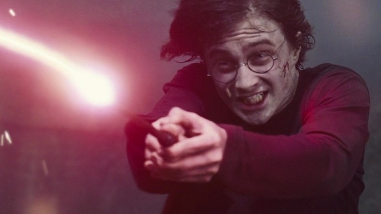 Harry in a wand battle with Voldemort in Harry Potter and the Goblet of Fire (2005)