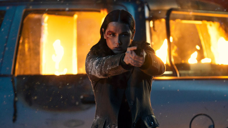 Eve Macarro in a gunfight