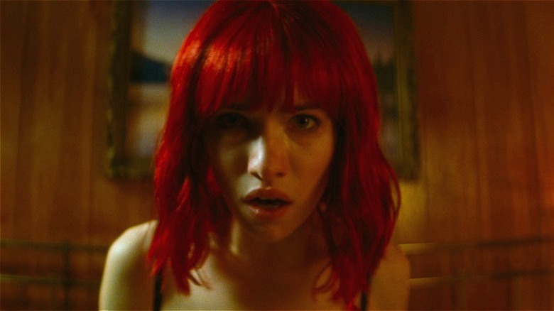 The Lady looking dazed in "Strange Darling" (2024)