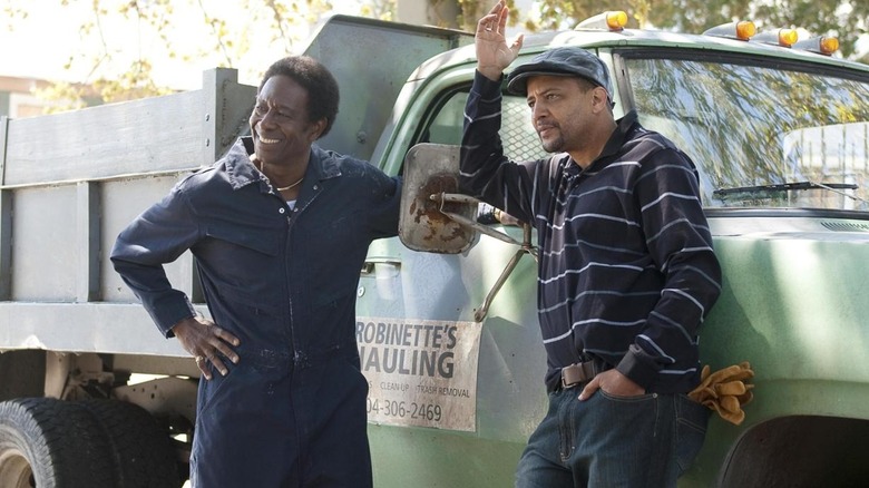 Two men in front of a pickup truck in "Treme" (2010-2013)