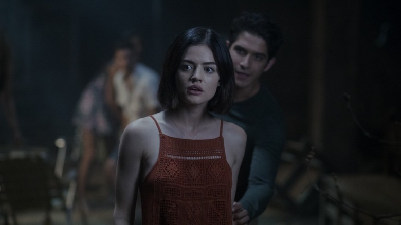 Olivia Barron inspects a noise in "Truth or Dare" (2018)