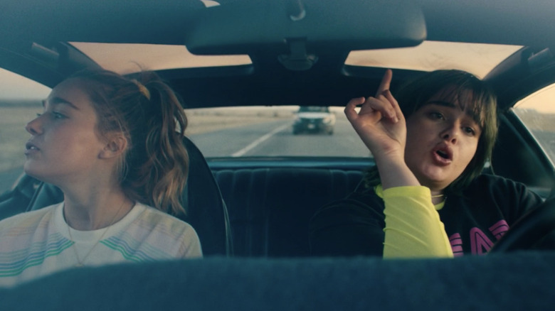 Veronica (Haley Lu Richardson)sitting in a car driven by her former best friend, Bailey (Barbie Ferreira)