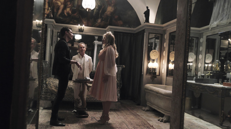 Tanya McQuoid and Quentin talk as Stefano looks on in "The White Lotus"