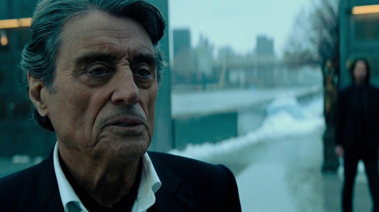 Winston talks to John outside in "John Wick: Chapter 4" (2023)