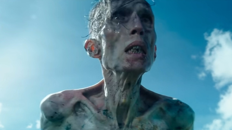 Infected man with the sky in the background in 28 Years Later