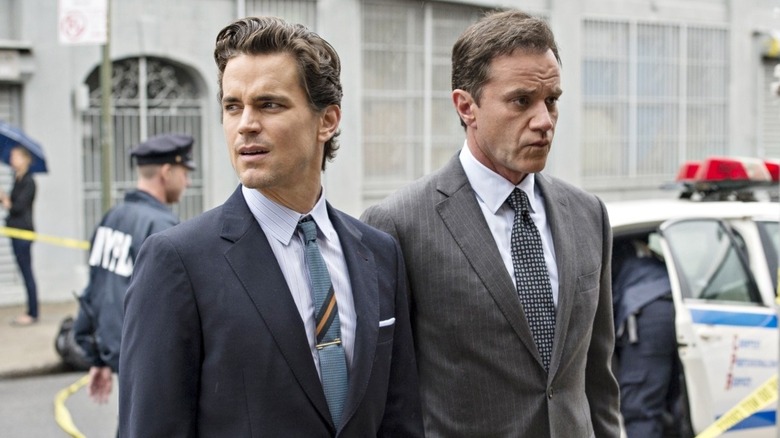 Neal and Peter at a crime scene in "White Collar"