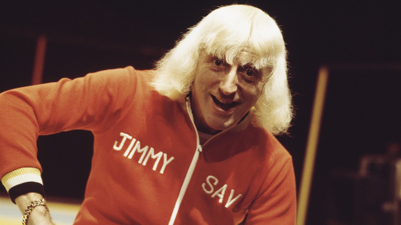 Jimmy Savile wearing a tracksuit