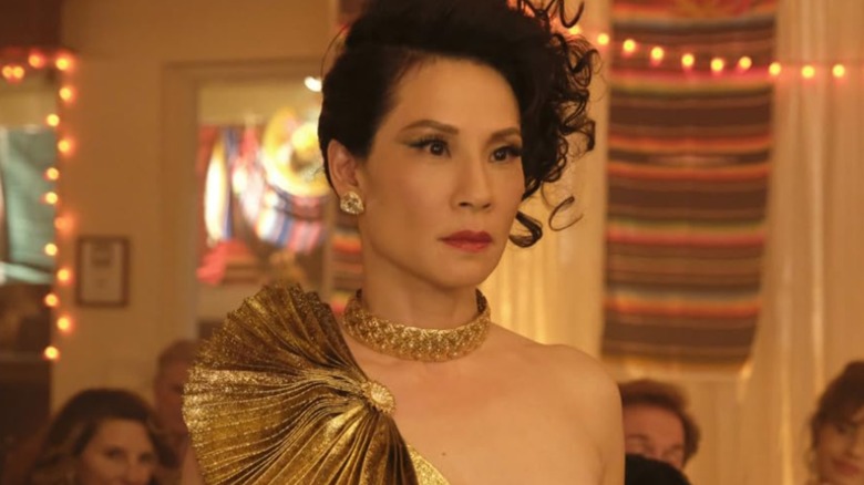 Simone at a social event in "Why Women Kill" (2019-2021)