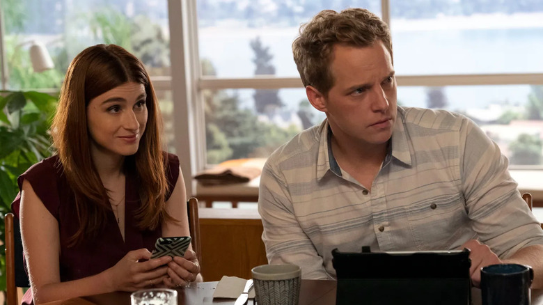 Gretchen and Jimmy at their kitchen table looking incredulously at someone on You're the Worst