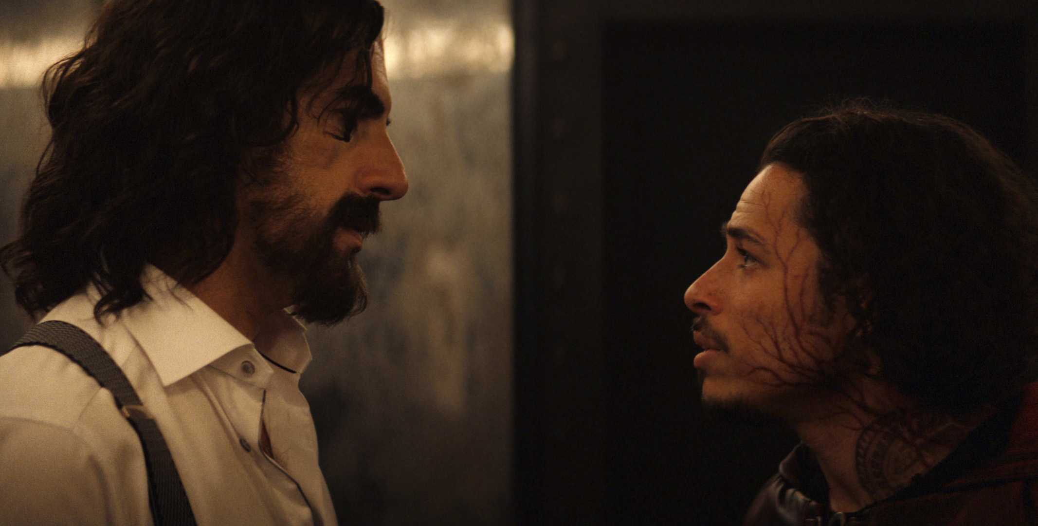 (L-R): Mephisto (Sacha Baron Cohen) and Parker Robinson/The Hood (Anthony Ramos) in Marvel Television's IRONHEART, exclusively on Disney+. Photo courtesy of Marvel. © 2025 MARVEL. All Rights Reserved.