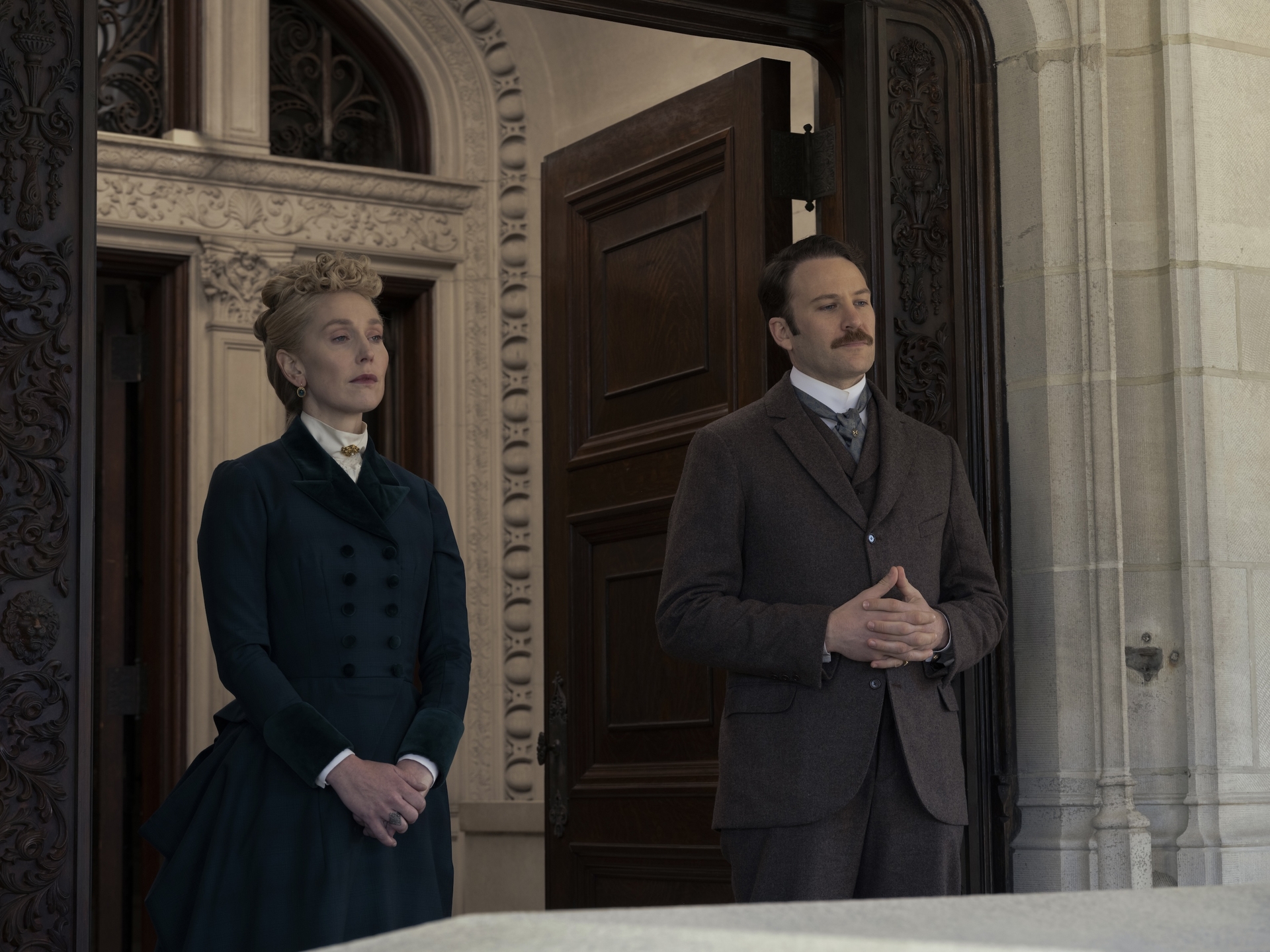 Hattie Morahan and Ben Lamb standing in the doorway in Episode 6 of Season 3 of 'The Gilded Age' 