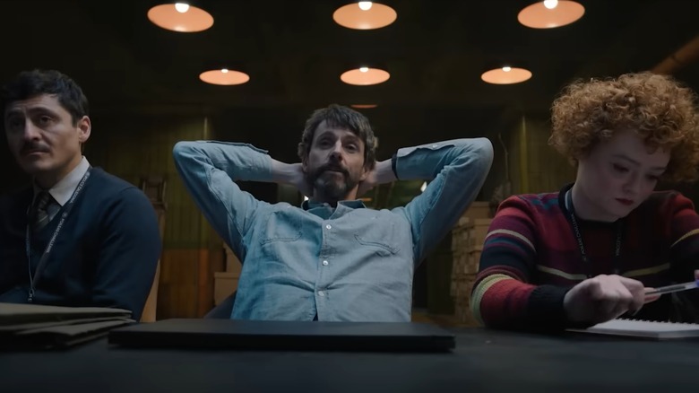 Akram Salim, Carl Morck, Rose Dickinson sitting at a table in "Dept. Q" (2025)