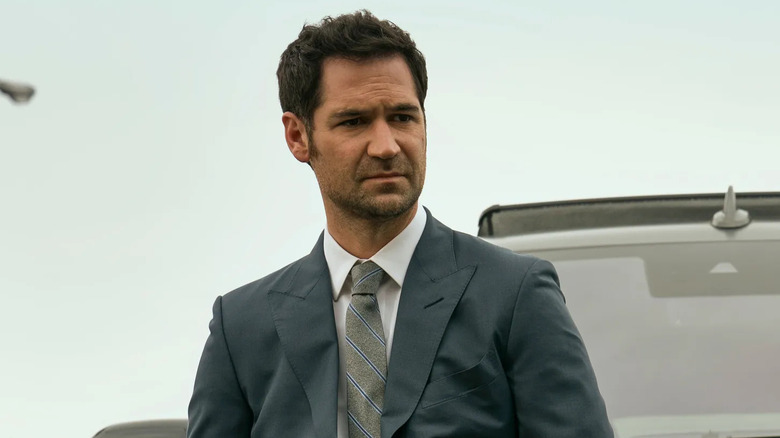 Mickey stands in front of the Navigator in "The Lincoln Lawyer" (2022-present)