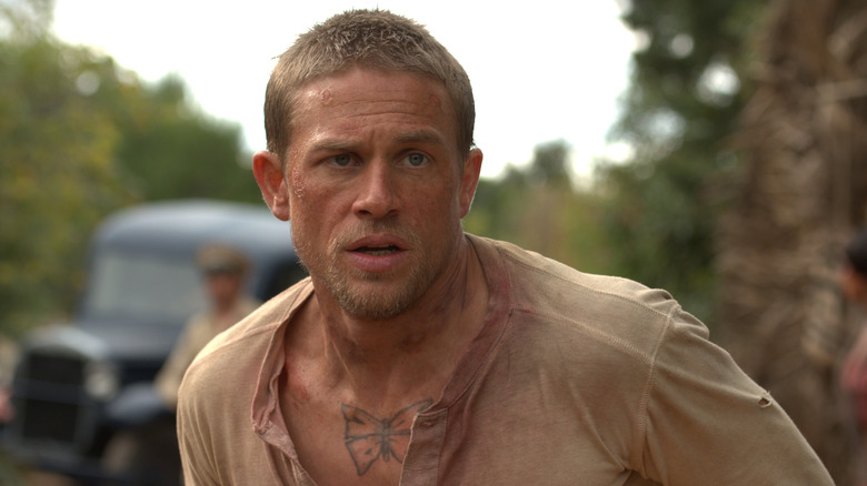 Papillon faces danger in "Papillon" (2018)