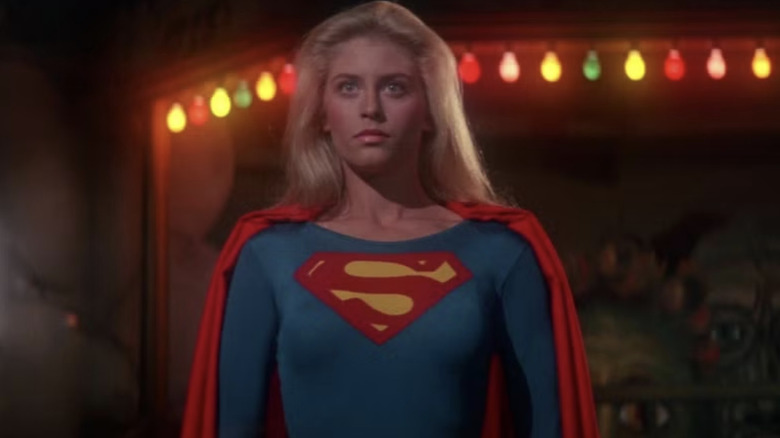 Supergirl stands in a night club in Supergirl (1984)