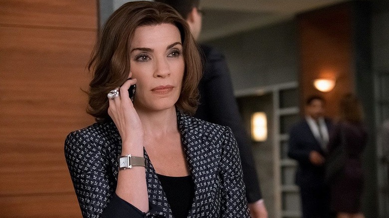 Alicia talks calmly on her cell phone in "The Good Wife" (2009-2016)