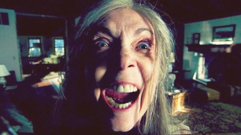 Nana makes an angry, open-mouthed face in "The Visit" (2015)