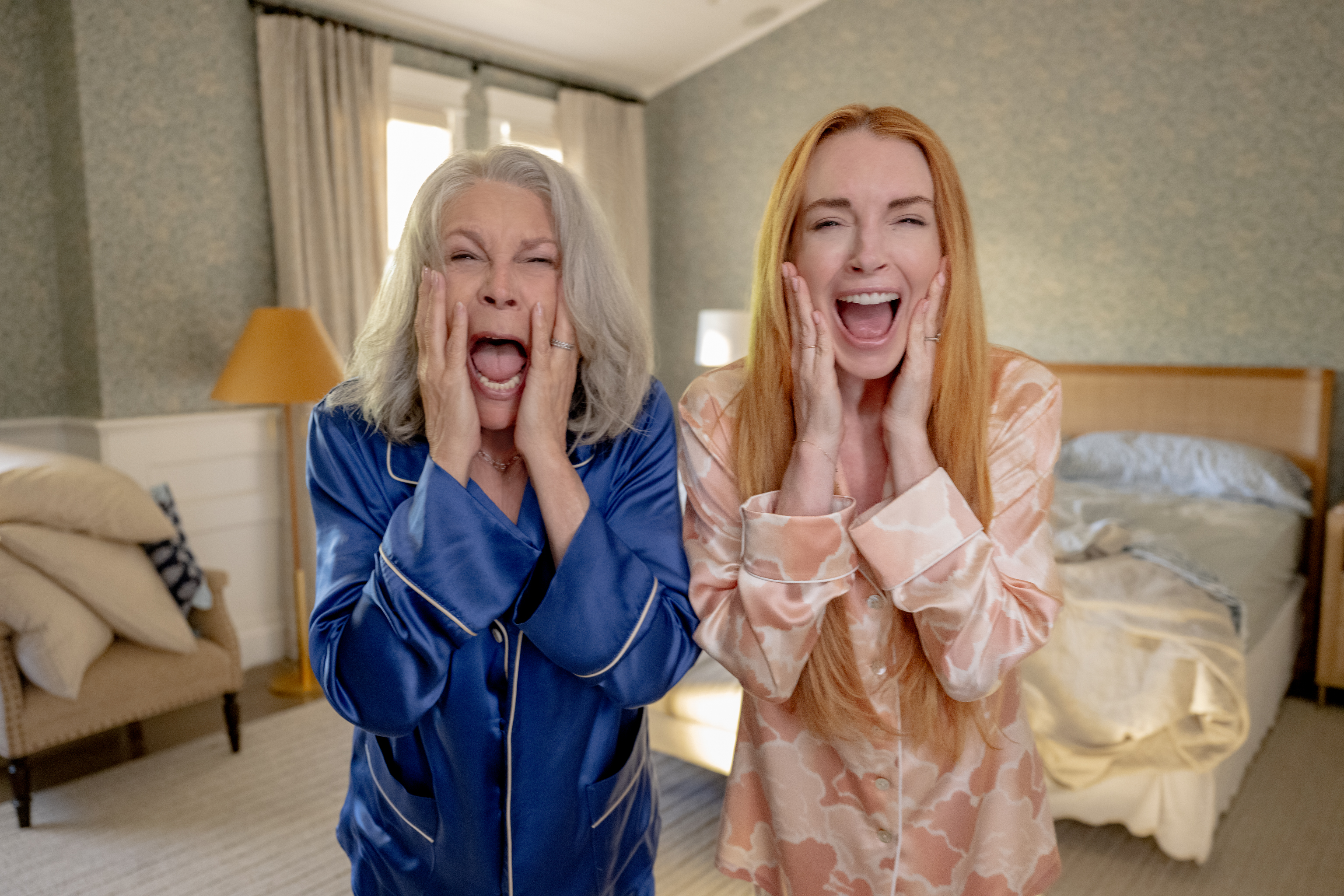 (L-R) Jamie Lee Curtis as Tess Coleman and Lindsay Lohan as Anna Coleman in Disney's live-action FREAKIER FRIDAY. Photo by Glen Wilson © 2024 Disney Enterprises, Inc. All Rights Reserved.