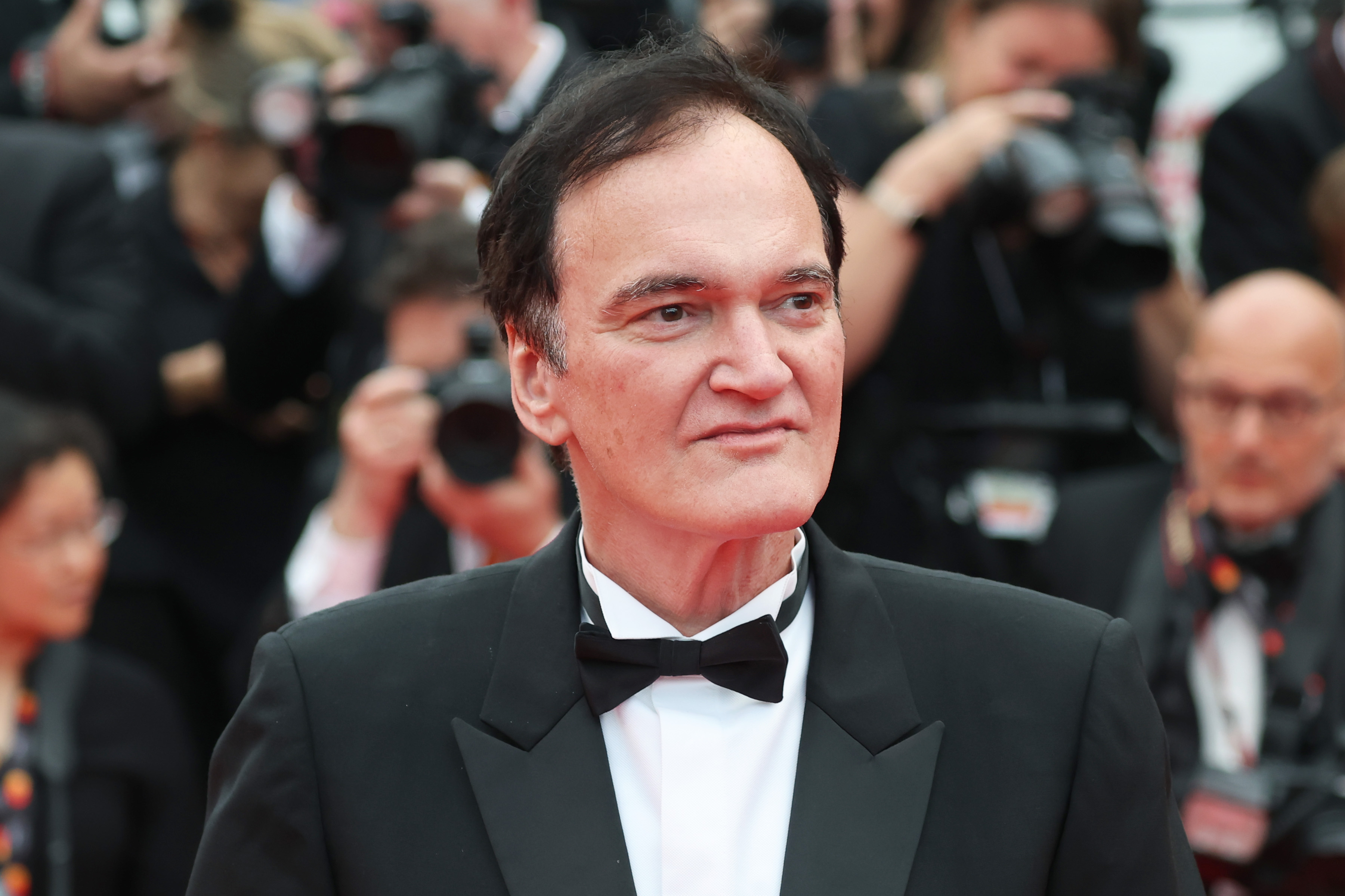 CANNES, FRANCE - MAY 13: Quentin Tarantino attends the red carpet for the opening ceremony and "Partir Un Jour" (Leave One Day) screening at the 78th annual Cannes Film Festival at Palais des Festivals on May 13, 2025 in Cannes, France. (Photo by Tristan Fewings/Getty Images)