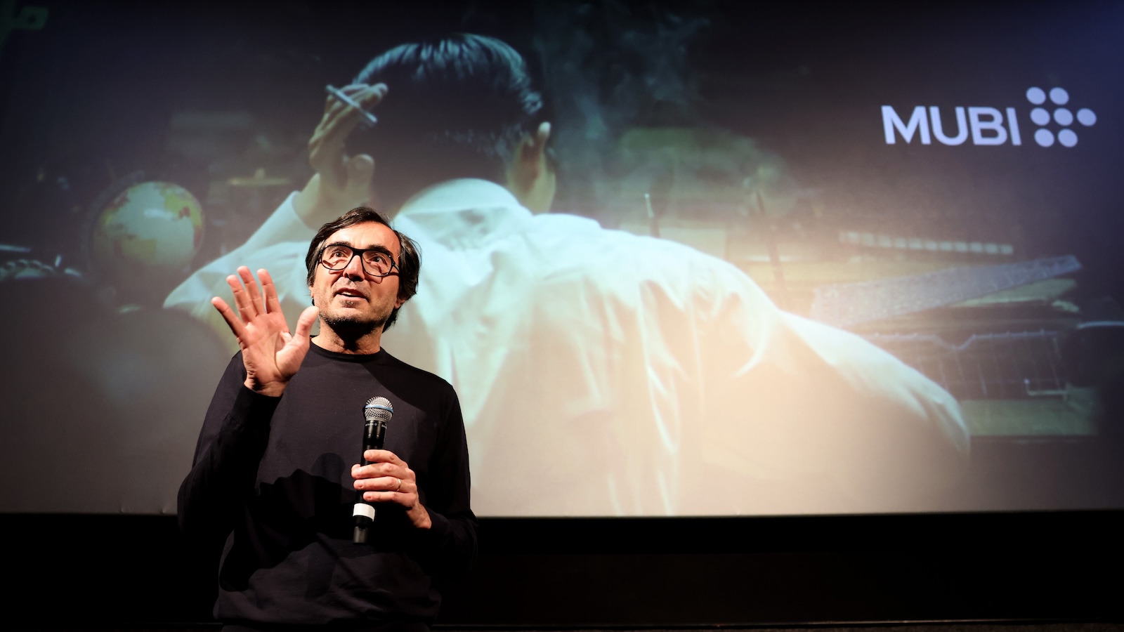 LONDON, ENGLAND - JUNE 06: Efe Cakarel speaks during the "Eighteen Years, One Obsession: The Story Behind Building MUBI" keynote during day five of SXSW London 2025 Rich Mix 06, 2025 in London, England. (Photo by Shane Anthony Sinclair/Getty Images for SXSW London)