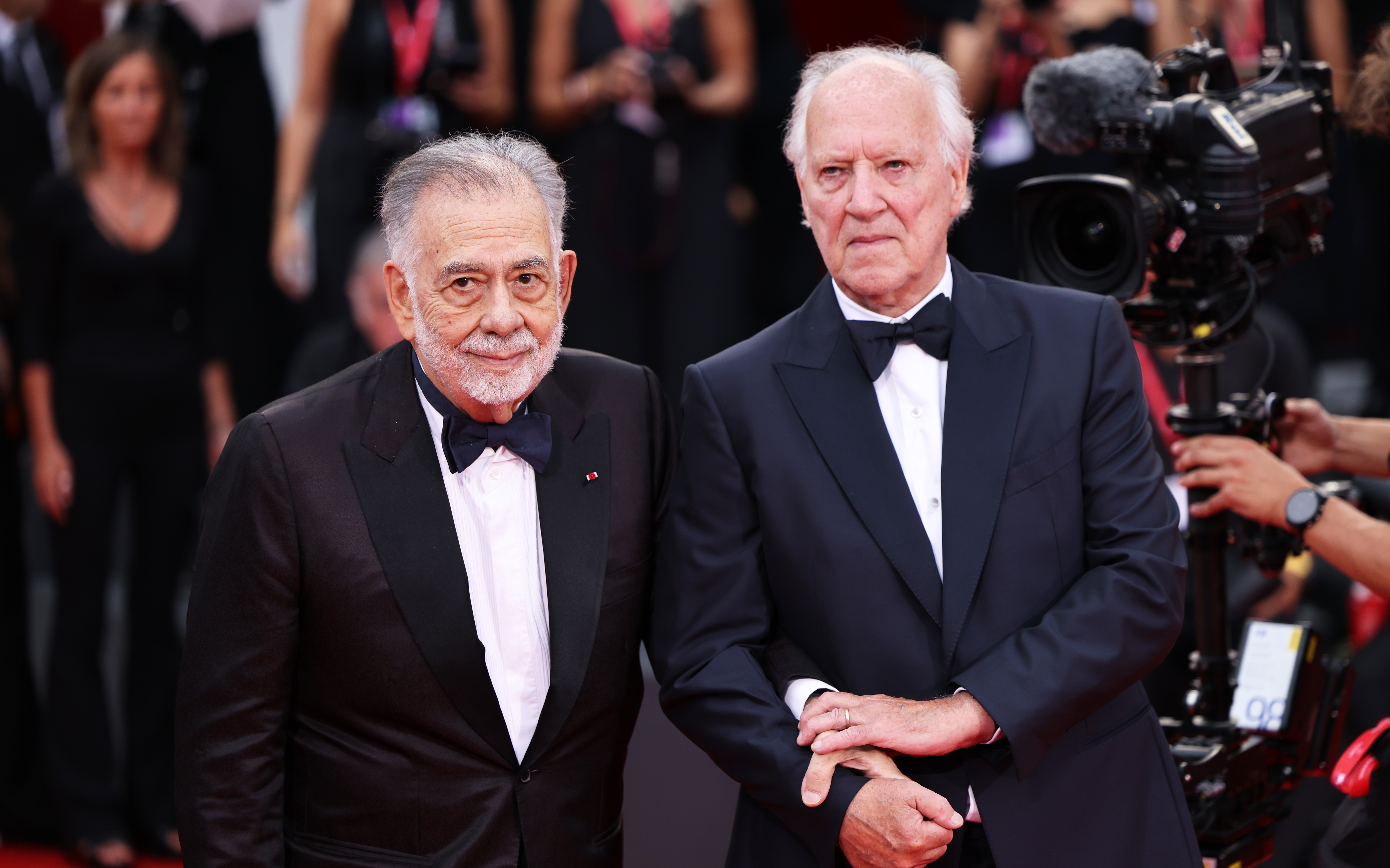 VENICE, ITALY - AUGUST 27: Francis Ford Coppola (L) and Werner Herzog attend the Opening Ceremony and Golden Lion For Lifetime Achievement during the The 82nd Venice International Film Festival at Sala Grande on August 27, 2025 in Venice, Italy. (Photo by Max Cisotti/Dave Benett/WireImage)