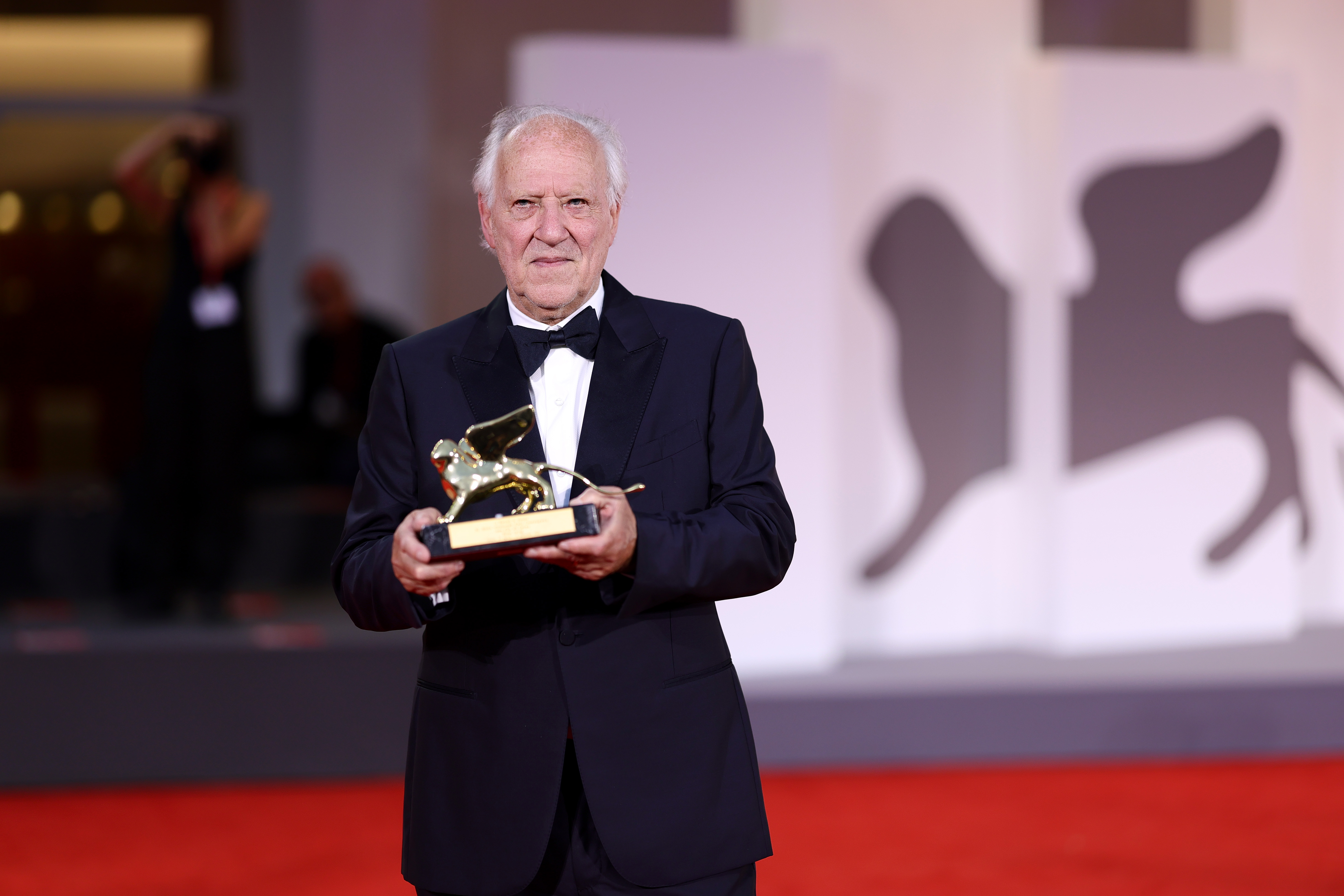 VENICE, ITALY - AUGUST 27: Werner Herzog poses with Golden Lion for Lifetime Achievement Award after the opening ceremony during the 82nd Venice International Film Festival on August 27, 2025 in Venice, Italy. (Photo by Andreas Rentz/Getty Images)