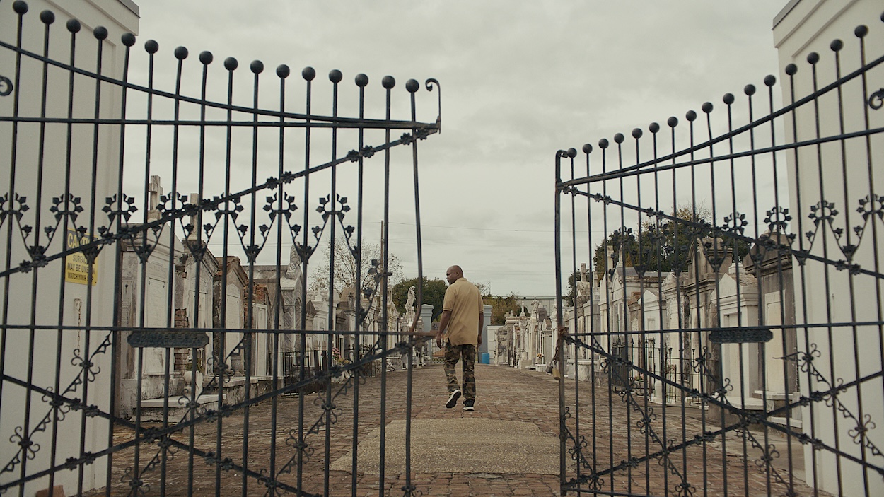 'Katrina: Come Hell and High Water,' the Netflix documentary series, features Shelton 'Shakespear' Alexander, shown here walking through the gates of St. Vincent De Paul Cemetery in New Orleans