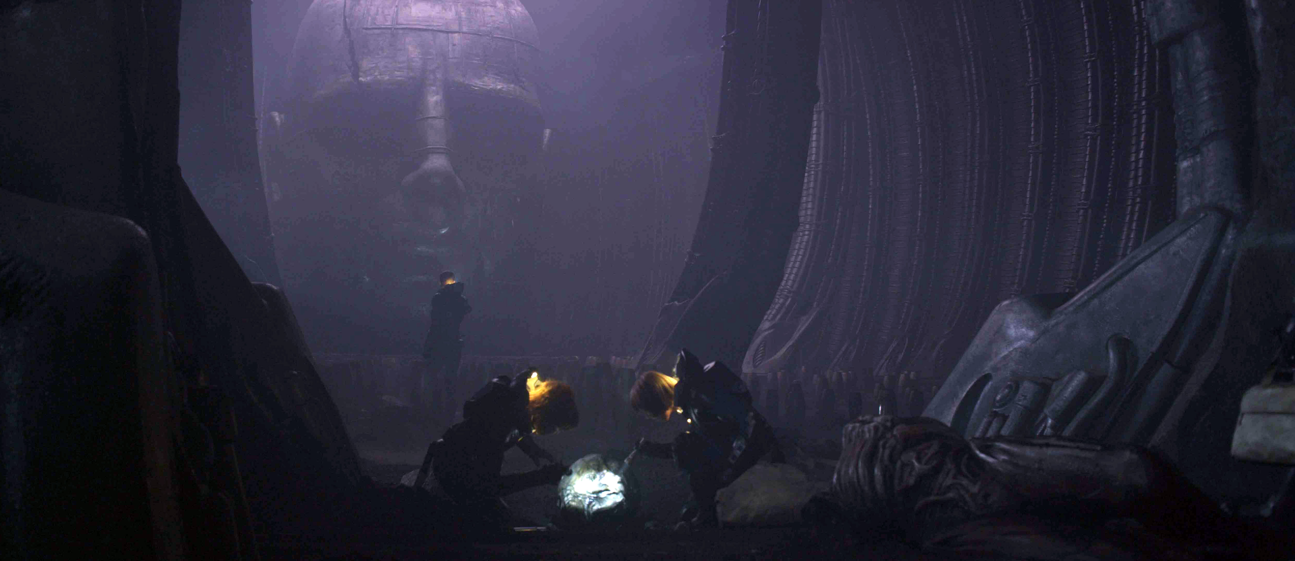 PROMETHEUS, from left: Michael Fassbender (background), Noomi Rapace, Kate Dickie, 2012. TM & copyright ©20th Century Fox Film Corp. All rights reserved/courtesy Everett Collection