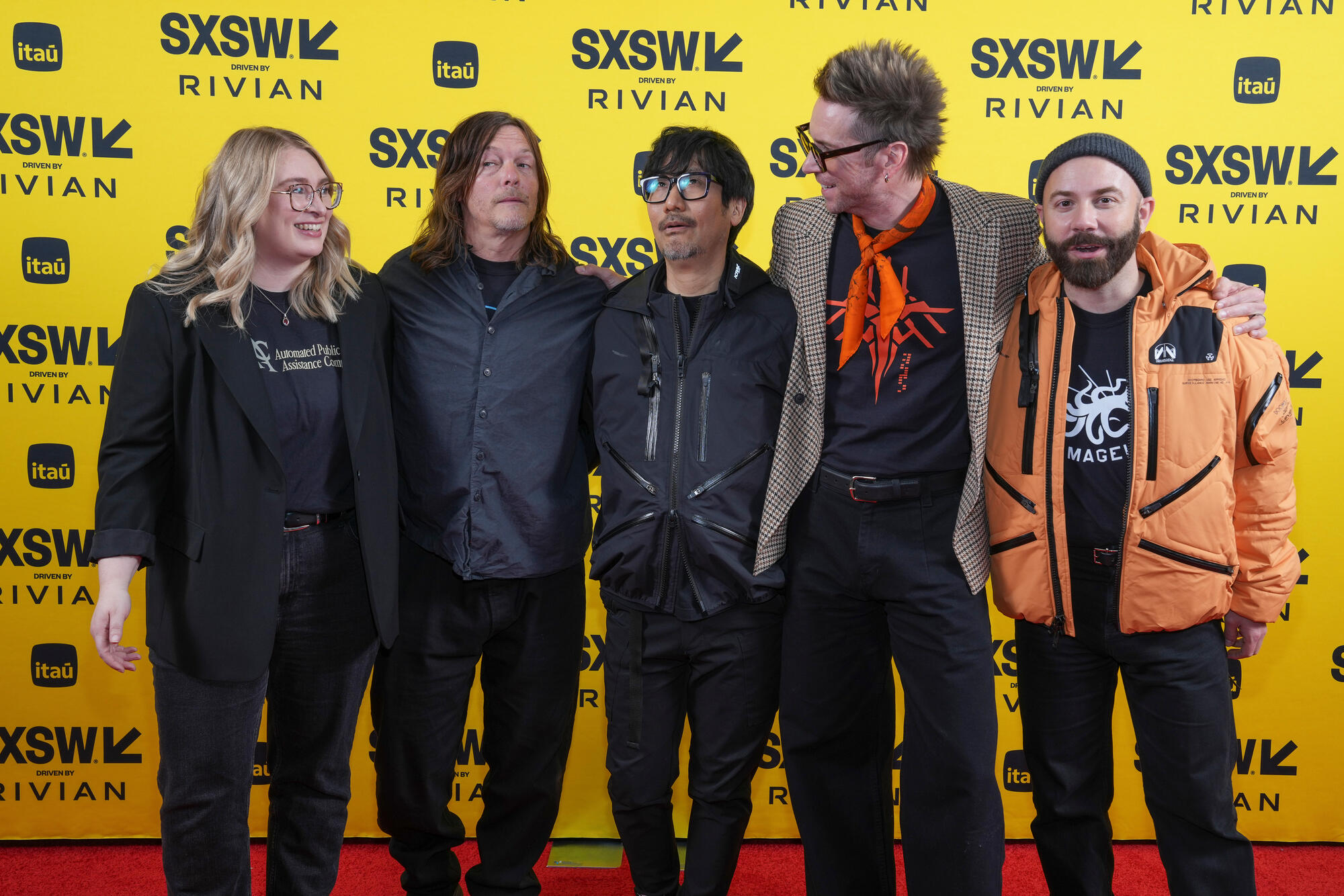 Kristen Zitani, Norman Reedus, Hideo Kojima, Troy Baker, Woodkid at Featured Session Hideo Kojima Presents "DEATH STRANDING 2: ON THE BEACH" at Austin Convention Center on March 09, 2025 in Austin, Texas.