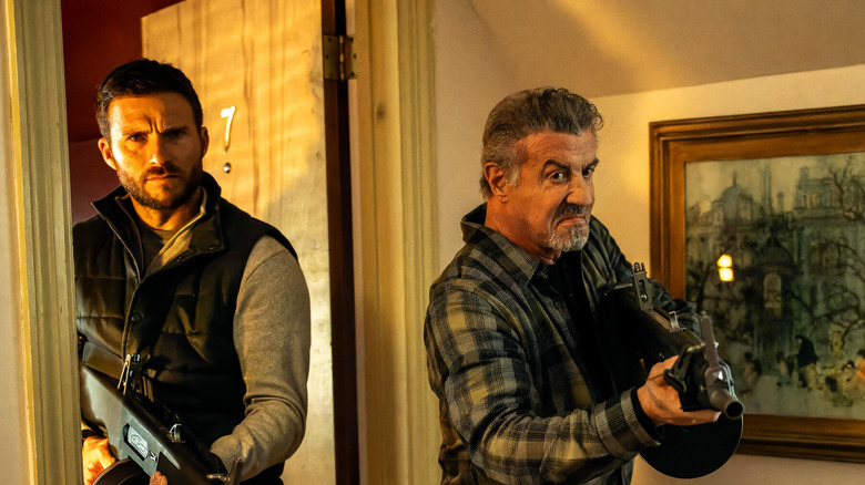 Joe and Agent Chester preparing to fight in Alarum (2025)