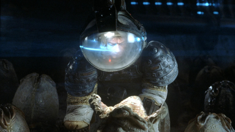 Kane peers into at a Xenomorph egg in "Alien" (1979)