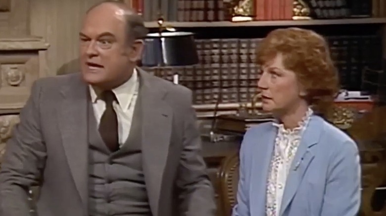 Arthur Carlson yells while Carmen looks at him on WKRP in Cincinnati