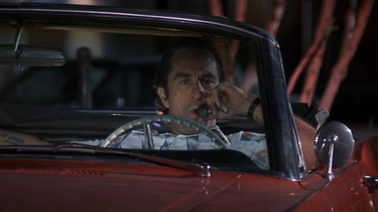 Max Cady smoking a cigar in his car in "Cape Fear" (1991)