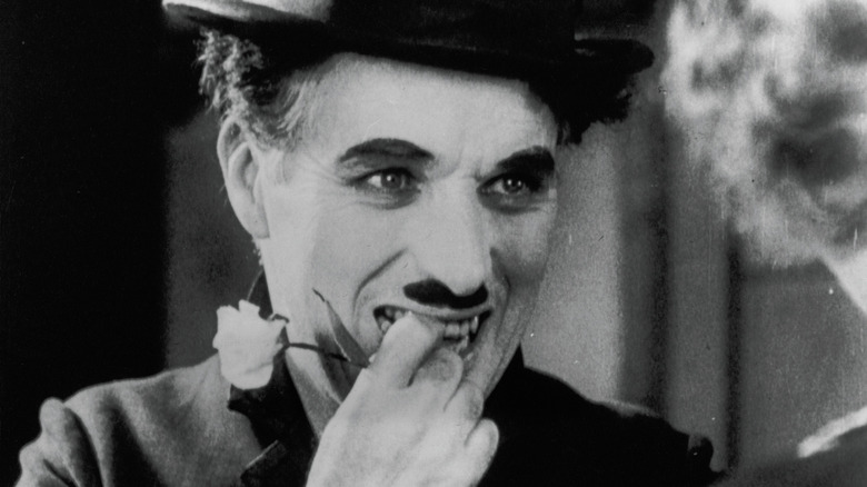 The Tramp grins at reuniting with his love in "City Lights" (1931)