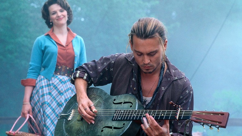 Vianne Rocher watching Roux play guitar in Chocolat