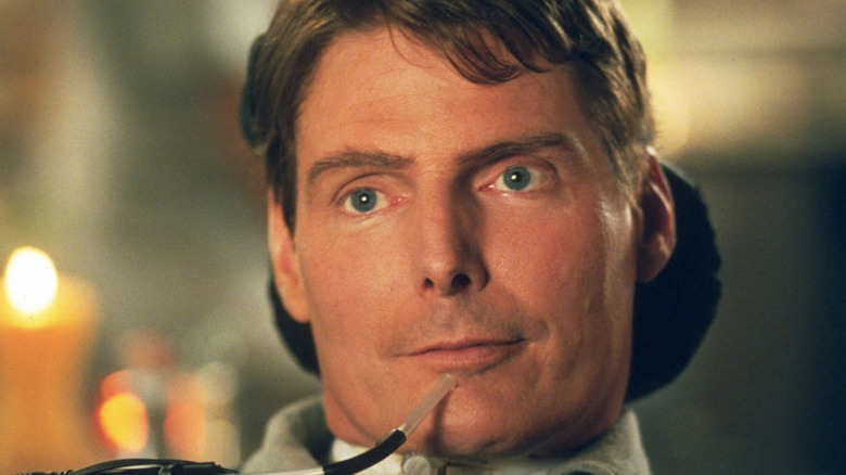 Jason Kemp looks outside the window in "Rear Window" (1998)