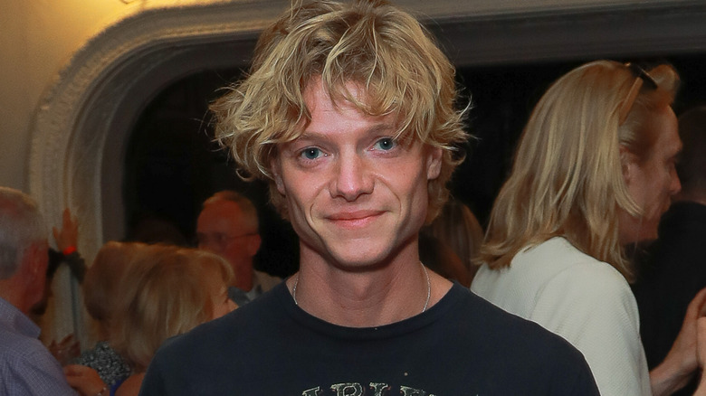 Tom Rhys Harries at a benefit in 2025